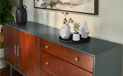 A buffet with colored vases