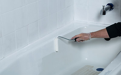 A hand with a roller