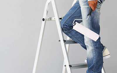 A man climbing on a ladder